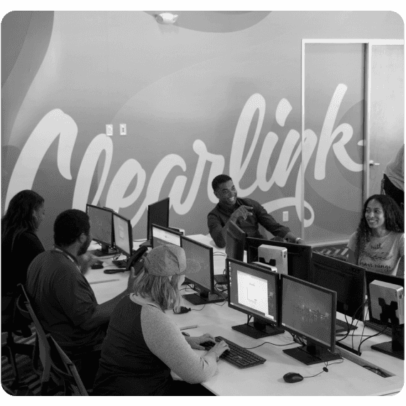 Clearlinkers at working at their desks