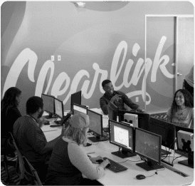 Clearlinkers at working at their desks